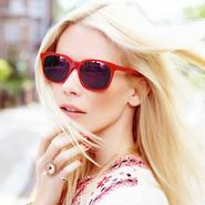 Claudia Schiffer wearing the Claudia Schiffer for Rodenstock sunglasses she donated