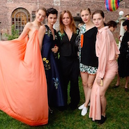 Stella McCartney surrounded by models