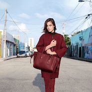 Alexa Chung sporting a Pénélope tote in Longchamp's fall/winter 2015 ad campaign