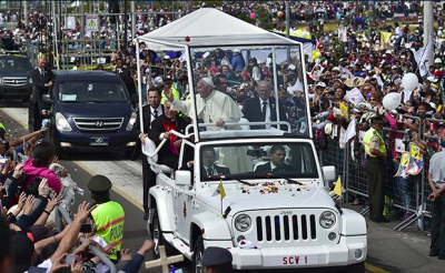 Pope Francis in a Jeep Wrangler