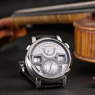 A. Lange & Söhne Zeitwerk Minute Repeater beside violin crafted in Saxony