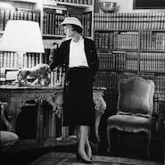 Gabrielle "Coco" Chanel in her apartment