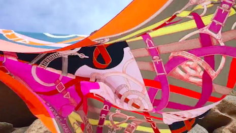 Hermès produces video vignettes of its products that nail the spirit of the brand, in this case, the trademark scarf showcased using contemporary technology to attract a younger clientele. Image credits: Hermès