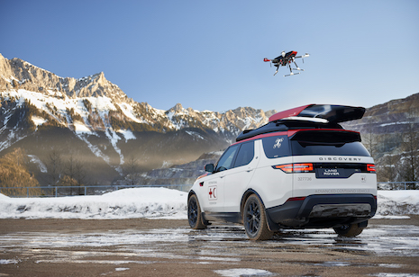 land rover. red cross discovery with drone