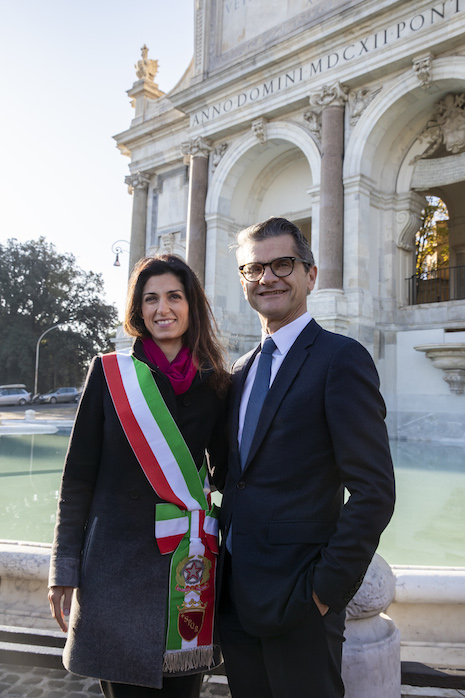 Roman mayor Virginia Raggi with Fendi CEO Serge Brunschwig standing in front one of the four restored fountains in Rome. Fendi paid for the restoration. Image credit: Fendi