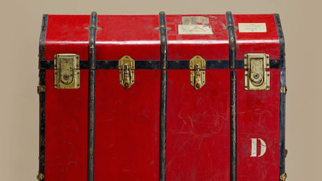 A vintage trunk carrying Brioni fabrics during the trunk shows from a different era. Image credit: Brioni