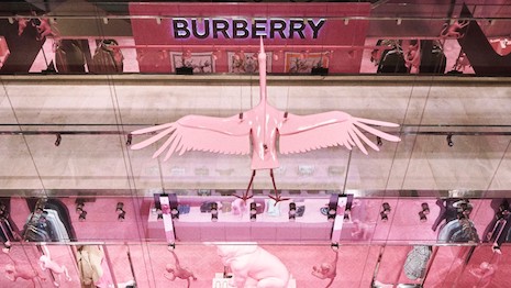 Burberry relies on animal effigies and casts adjacent to its Evolution spring/summer 2020 collection to woo shoppers visiting Paris' famed Printemps store on Boulevard Haussmann. Image courtesy of Burberry