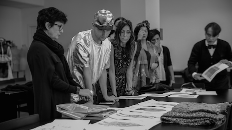 Linda Loppa instructing fashion design students at Polimoda in Florence, Italy. Image courtesy of Polimoda 