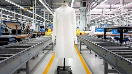 Zegna has repurposed facilities in Italy and Switzerland to make protective hospital suits for healthcare workers on the front lines of the COVID-19 coronavirus. Image courtesy of Ermenegildo Zegna