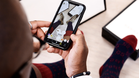 Snapchat users can now use AR tech to virtually try on Gucci footwear to see if they like the merchandise and then have the option to buy it directly from that location. Image courtesy of Gucci