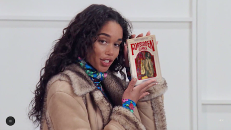 In the faux LV Pre-Fall 2020 Book Club, Laura Harrier reads from Nicolas Ghesquière's "passion-soaked romance, 'Forbidden Games,' where desire has its own rules of play." Image credit: Louis Vuitton