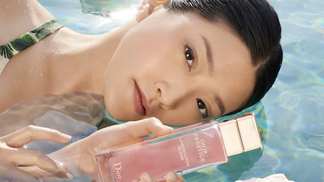 Dior Prestige campaign envisions summer in the countryside with a swimming pool. Image courtesy of Dior