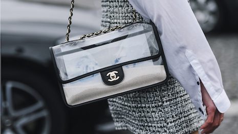 2021 has been good to Chanel. There has been great demand for its handbags, causing inventory concerns, as well as three price increases in China. Will 2022 be as kind? Image credit: Shutterstock