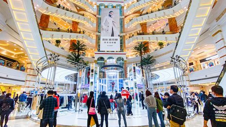 While it feels as if online shopping platforms are replacing them, shopping malls still play a crucial part in the luxury industry. Image credit: Global Harbor Mall's Weibo