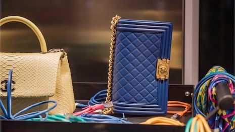 Luxury goods, notably high-margin items like bags and shoes, could be impacted if COVID-19 lockdowns increase in China. What is a global luxury brand to do? Image credit: Shutterstock
