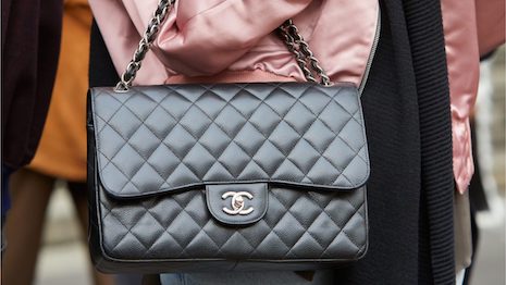 Chanel has announced another price increase. But this is sure to backfire as Chinese youth have found alternative sources of luxury in the resale market. Image credit: Shutterstock