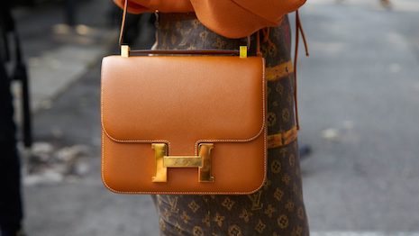 Chinese HNWIs are selling their Rolex and Hermès to raise quick cash. As the economy tumbles, is luxury really recession-proof? Image credit: Shutterstock