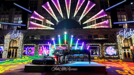 At the Saks Holiday Show, Sir Elton John performed "Your Song" in celebration of the ingegrated partnership between Saks and the Elton John AIDS Foundation. Image credit: Saks