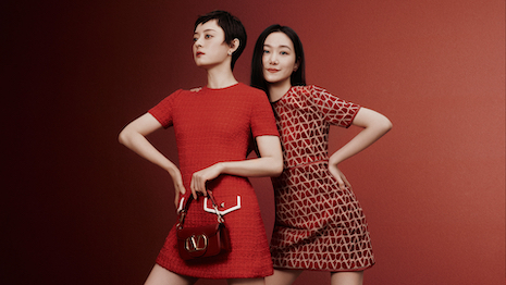 Valentino’s Rosso Red V Logo Short Dress, Garavani Locò bag, Timeless Bouclé Short Dress and more are on display in a new campaign. Image credit: Valentino