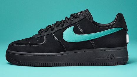 The collaborative "Air Force 1 1837" sneaker is materialized in black suede with Nike’s signature swoop logo colored in Tiffany Blue. Image credit: Tiffany & Co.
