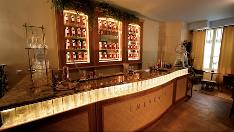 The bar from Eminente serves as the heart of this home-like popup. Image credit: LVMH