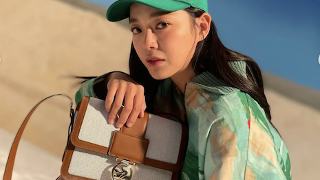 Ms. Se-jeong posing for the the brand's spring/summer 2023 "glamping" themed campaign. Image credit: Longchamp