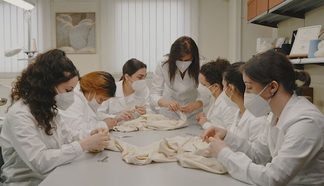 The program Ms. Costantin speaks of earlier on in the excerpt involves the clothing company’s Knitwear School plus a Leather Craft course, two offerings created and promoted by the Accademia dei Mestieri Loro Piana. Image credit: Loro Piana