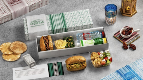 Special iftar boxes served during select Emirates routes are decorated in the pattern that recalls traditional Bedouin weaving. Image credit: Emirates