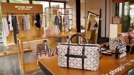 In a sign of growing confidence in China, international luxury brand executives are beating a path to the country’s door following the lifting of travel restrictions. Image credit: Michael Kors