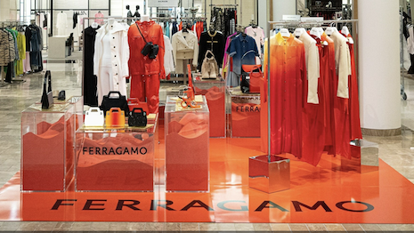 The collection is displayed in Ferragamo's new signature red at select Neiman Marcus locations. Image credit: Ferragamo