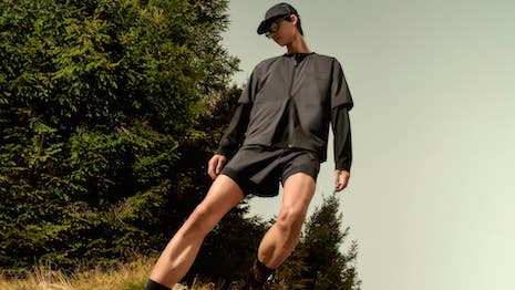 Outdoor runners test the performance of the Zegna x norda collection footwear by running through the Oasi Zegna reserve in the Italian Alps. Image credit: Zegna Group