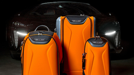 The McLaren 60th Anniversary Collection includes a range of limited-edition luggage styles in McLaren's signature papaya shade. Image credit: Tumi