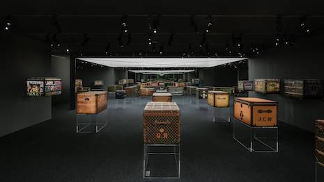 The Malle Courrier centers a new exhibition featuring the maison's most iconic trunk designs, with originals dating back to the 19th century. Image credit: Louis Vuitton