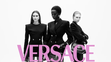 The model collective emphasizes silhouette in their posing, revealing expressions of power as they showcase confidence. Image credit: Versace