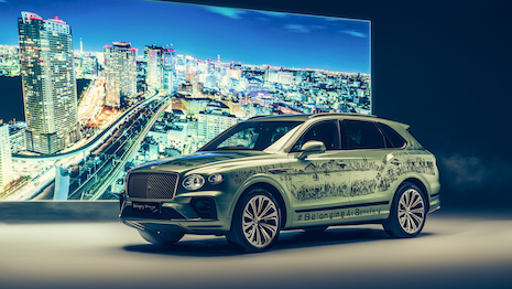 The vehicle features 29 landmarks from around the globe hand-painted from memory by Mr. Wiltshire. Image credit: Bentley