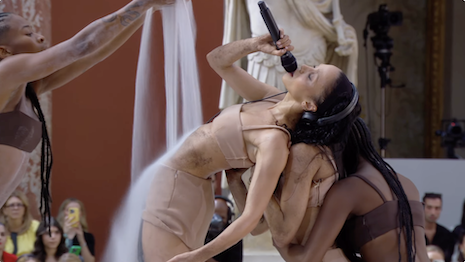 The dancers and FKA Twigs moved fluidly, pouring sand on each other or smudging dirt on themselves in a unique type of land-based performance art. Image credit: Valentino