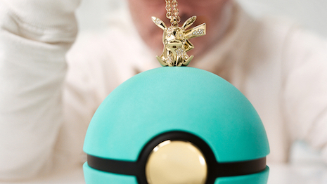 A Tiffany Blue Poké Ball holds gold Pikachu pendants. Image courtesy of Tiffany & Co.