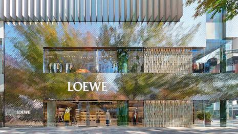 The store's exterior reflects the plants and trees growing around it, establishing a specific sense of place for clients. Image credit: LVMH/ARR
