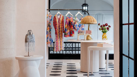 The brand is inviting guests to shop accessories, beauty and ready-to-wear at the colorful opening. Image credit: Carolina Herrera
