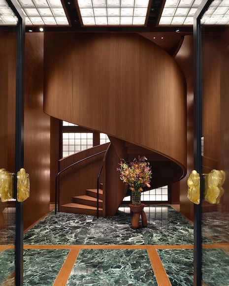 The new store has a staircase and florals that match the ones in the Paris boutique. Image credit: Bottega Veneta/François Halard