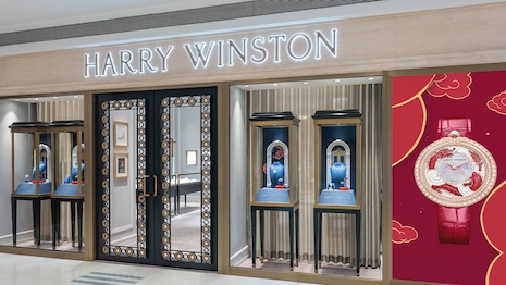 The mall features the brand's signature gated entry way, with gold rosette embellishments to boot. Image credit: Harry Winston