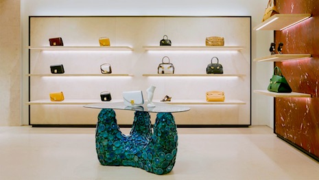 Entitled “Acquario,” an artistic piece is undulated with turquoise discs and glass. Image credit: Ferragamo