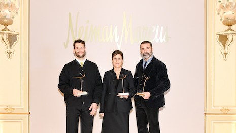 Today, Mr. Jacquemus, Ms. Chiuri and Mr. Roseberry are being honored on the Times Square NASDAQ screens. Image credit: Neiman Marcus Group