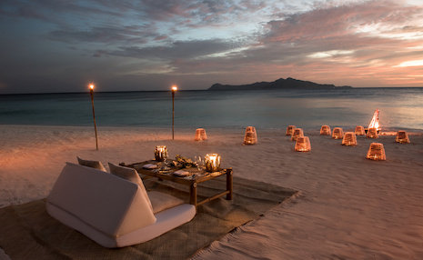 Beachside dining and romantic settings are touted by Aman's resort. Aman Resorts International
