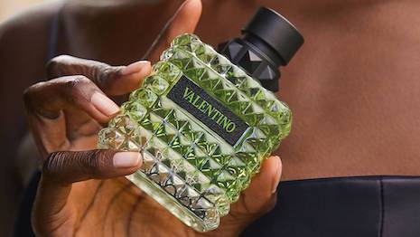 The new perfume is housed in a 100 percent recycled glass bottle. Image credit: Valentino