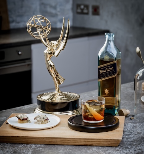 The brand is making specially-crafted cocktails with both Blue Label and stars of “The Bear” in honor of the 76th Emmy Awards. Image credit: Johnnie Walker